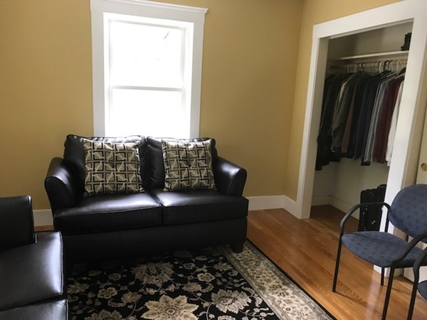 2 Jackson Road Medford, MA 02155 - Photo 16 of 23 a living room with furniture and a window
