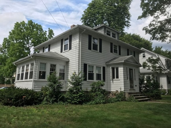 2 Jackson Road Medford, MA 02155 - Photo 2 of 23 a front view of a house with a garden