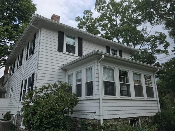 2 Jackson Road Medford, MA 02155 - Photo 3 of 23 a front view of a house with plants