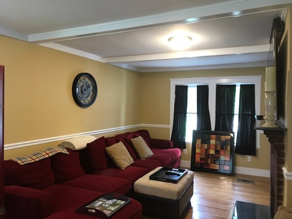 2 Jackson Road Medford, MA 02155 - Photo 5 of 23 a living room with furniture and a large window