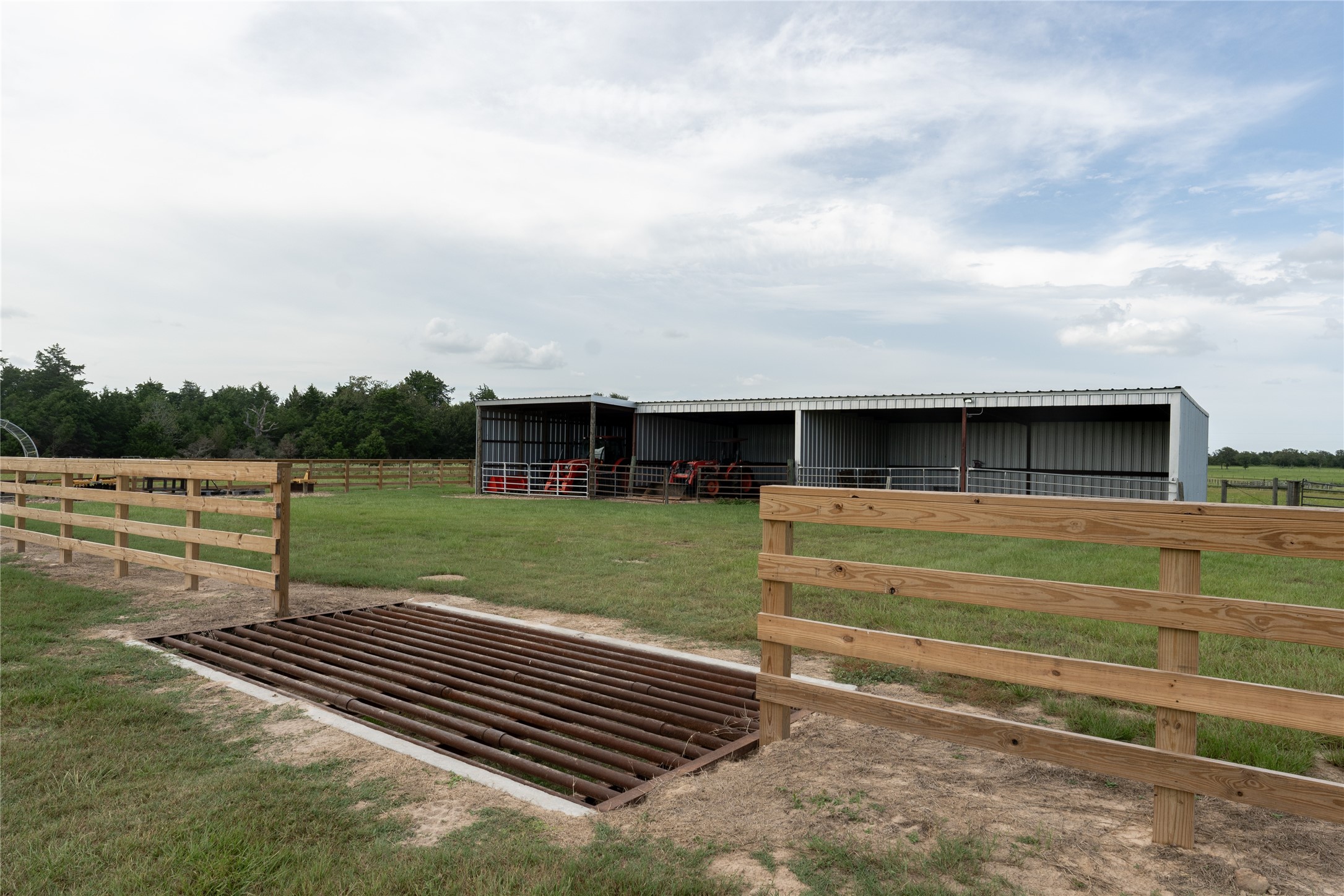 0 Aztec Lane Cat Spring, TX 78933 - Photo 3 of 24 1440 sq ft barn with cattle guard to protect tractors and other farming equipment from cattle