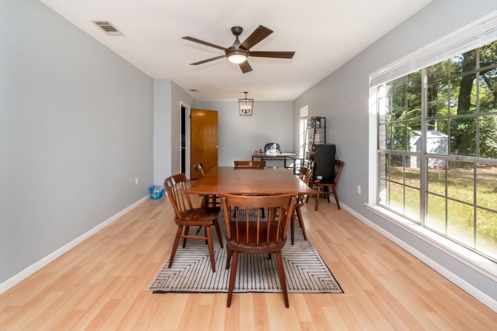 6405 1st Street Wilmer, AL 36587 - Photo 4 of 38 Dining space with light wood-style flooring and a ceiling fan