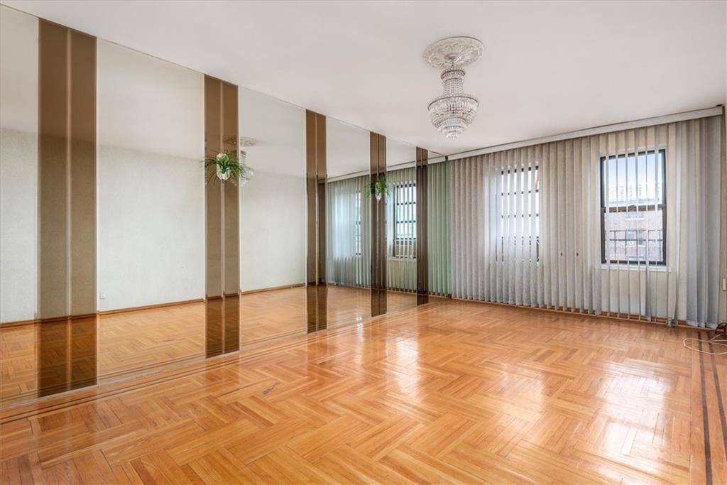 2425 Kings Highway, Unit E16 Brooklyn, NY 11229 - Photo 7 of 11 a view of an empty room with window and a livingroom