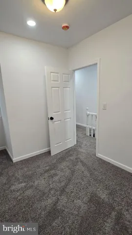 an empty room with closet