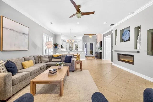 a close view of a fireplace with a clock on the wall
