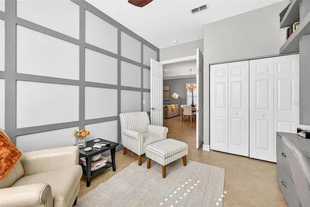 a bed room with a bed and a couch