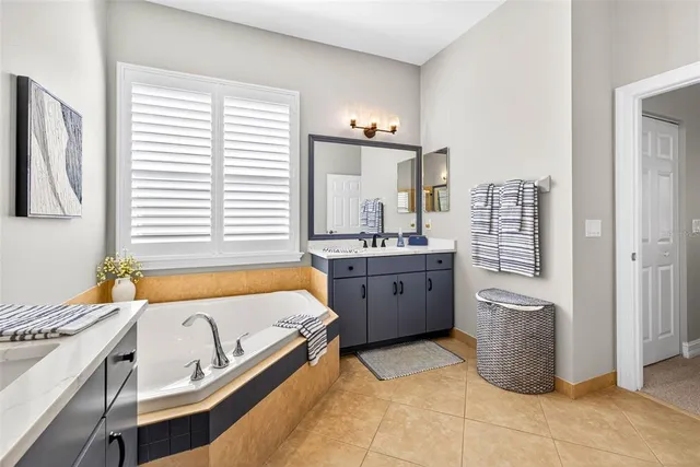 a living room with furniture rug and wooden floor