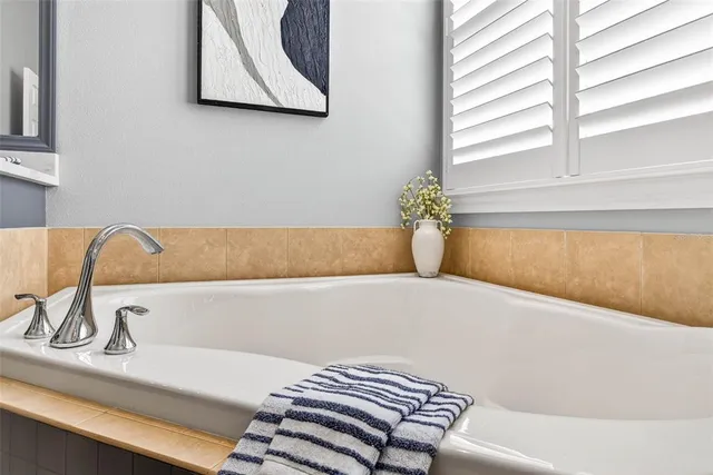 a view of a house with a yard and garage