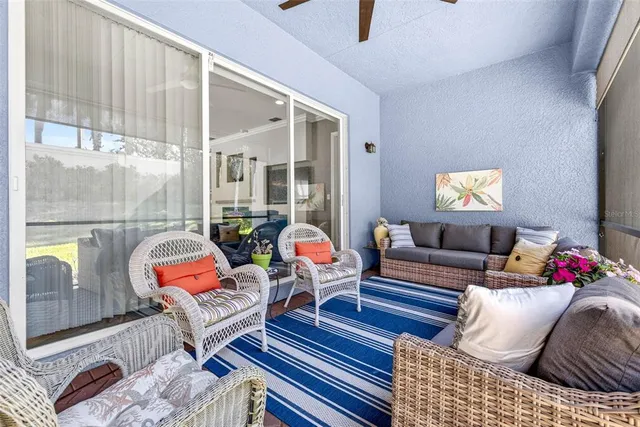 an aerial view of residential house with outdoor space and swimming pool