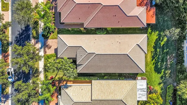 a view of a swimming pool with a table and chairs