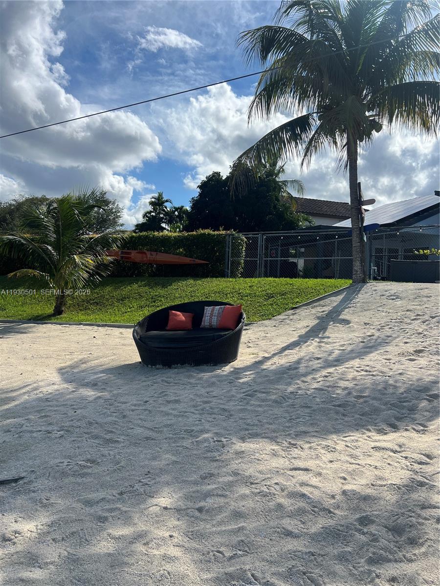 6101 Southwest 153rd Court Road Miami, FL 33193 - Photo 16 of 49 a house with swimming pool in front of it