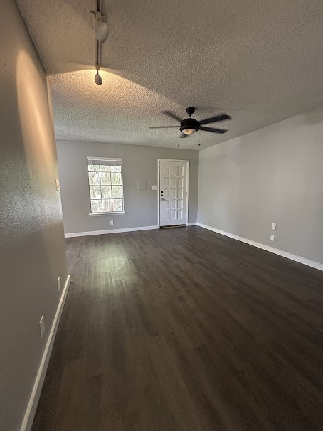 3436 Willowrun Drive, Unit D Austin, TX 78704 - Photo 2 of 9 a view of an empty room with a window