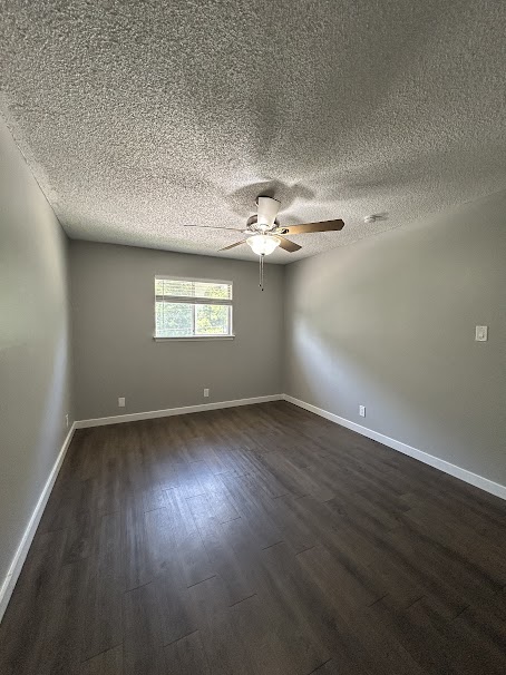 3436 Willowrun Drive, Unit D Austin, TX 78704 - Photo 8 of 9 a view of an empty room and window