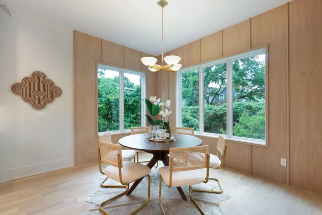 a kitchen with a sink cabinets and refrigerator