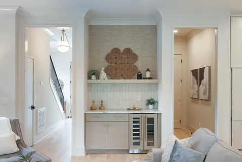 a kitchen with a sink cabinets and stainless steel appliances