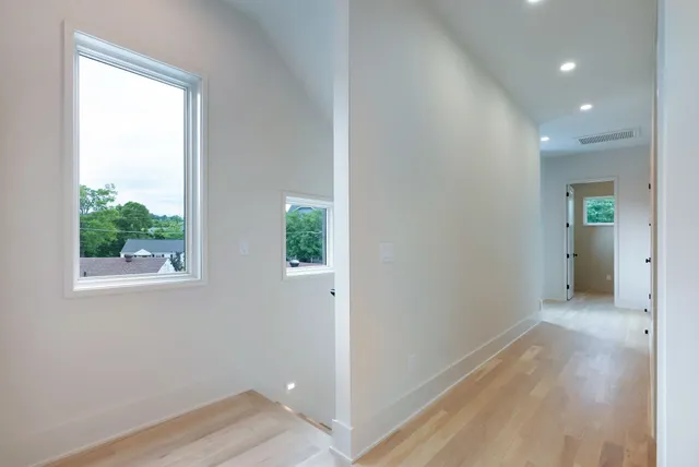 a kitchen with a sink cabinets and stainless steel appliances