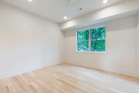 a bathroom with a shower and a tub