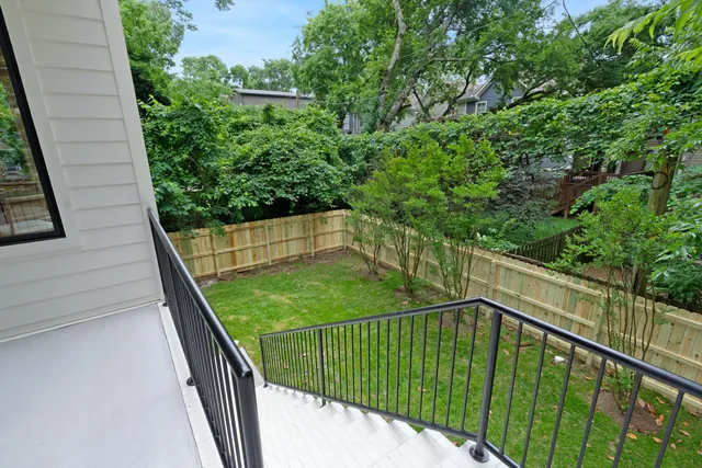 a view of balcony and yard