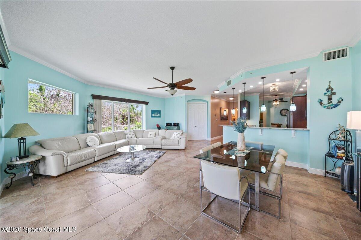 6005 Highway 1, Unit 101 Rockledge, FL 32955 - Photo 16 of 57 a living room with furniture and wooden floor