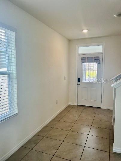 31284 Penny Surf Loop Wesley Chapel, FL 33545 - Photo 13 of 15 a view of an empty room and window