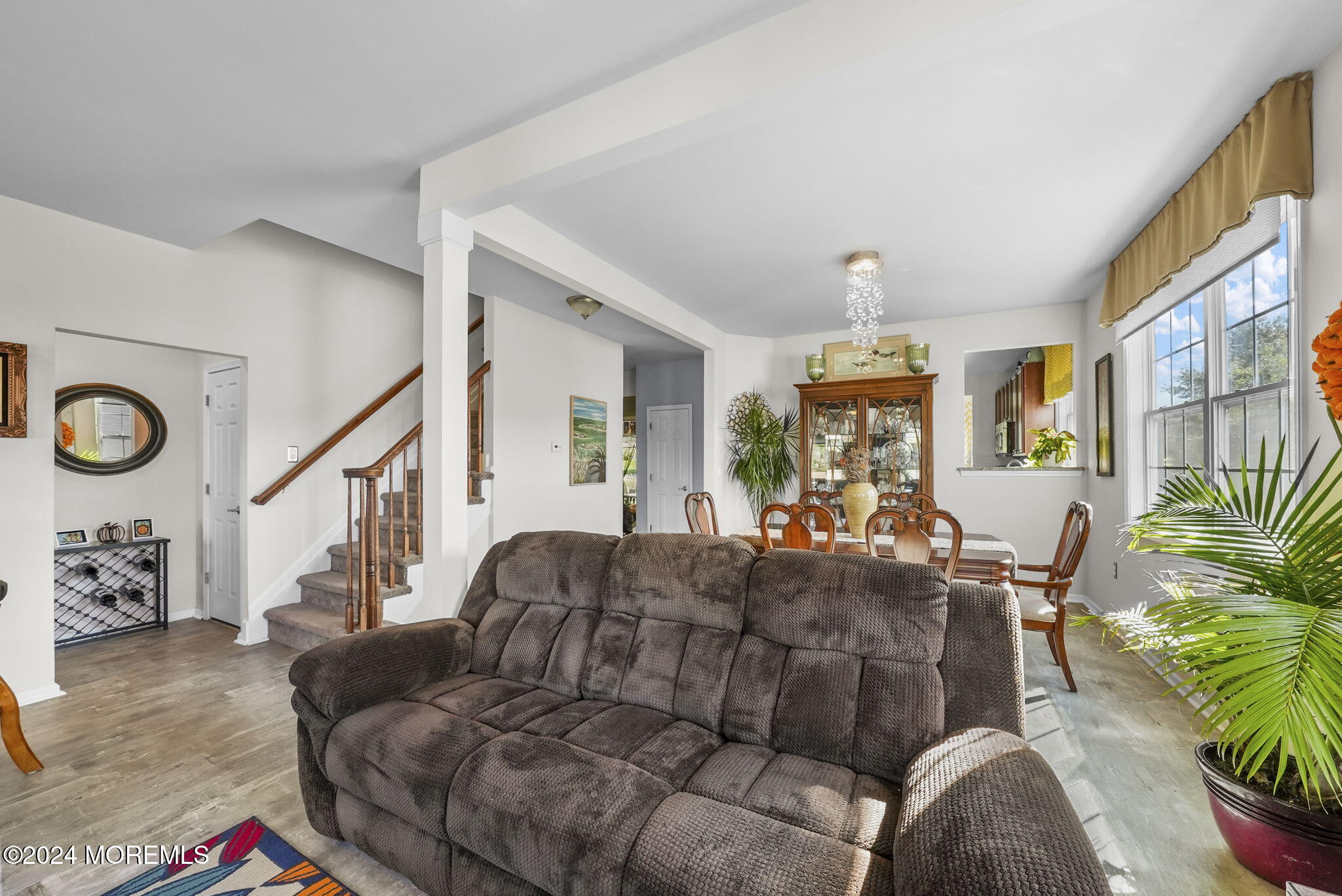 30 Silver Maple Lane Howell, NJ 07731 - Photo 11 of 43 a living room with furniture and wooden floor