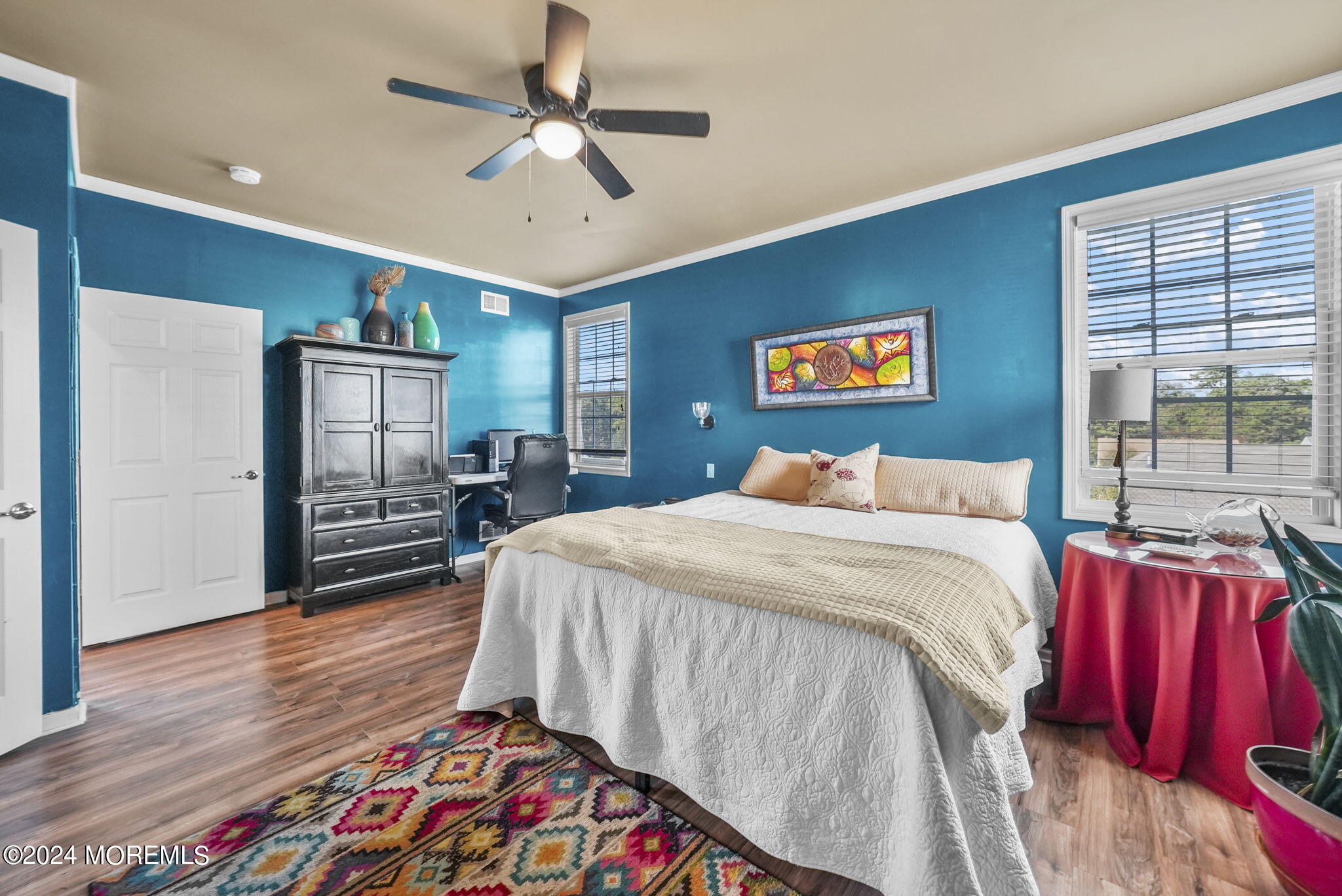 30 Silver Maple Lane Howell, NJ 07731 - Photo 18 of 43 a spacious bedroom with a bed and a chandelier