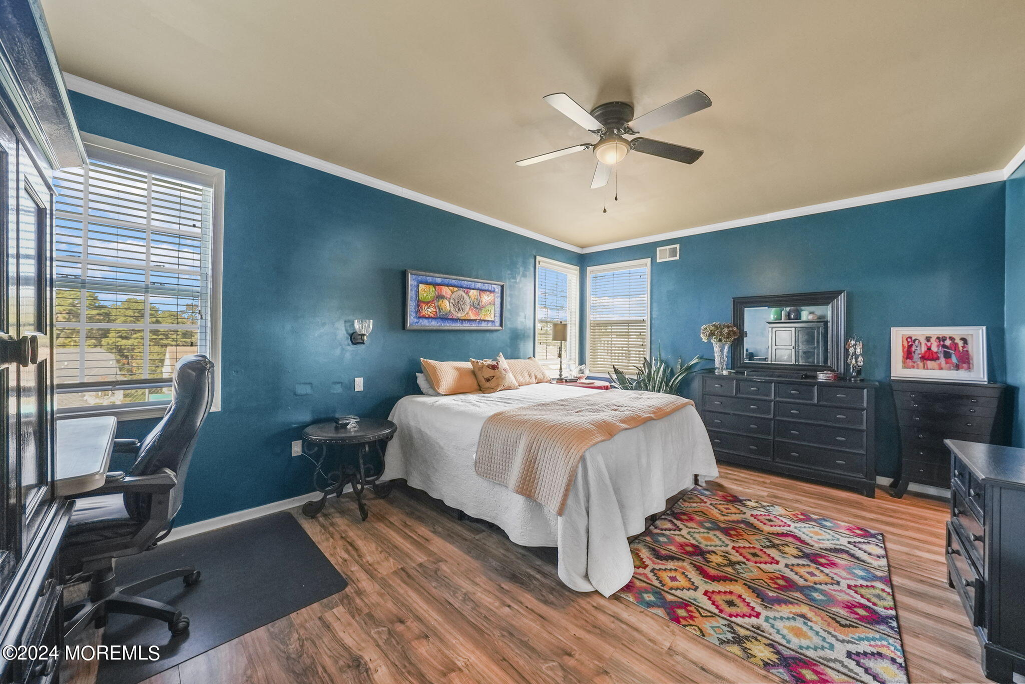 30 Silver Maple Lane Howell, NJ 07731 - Photo 19 of 43 a spacious bedroom with a bed and wooden floor