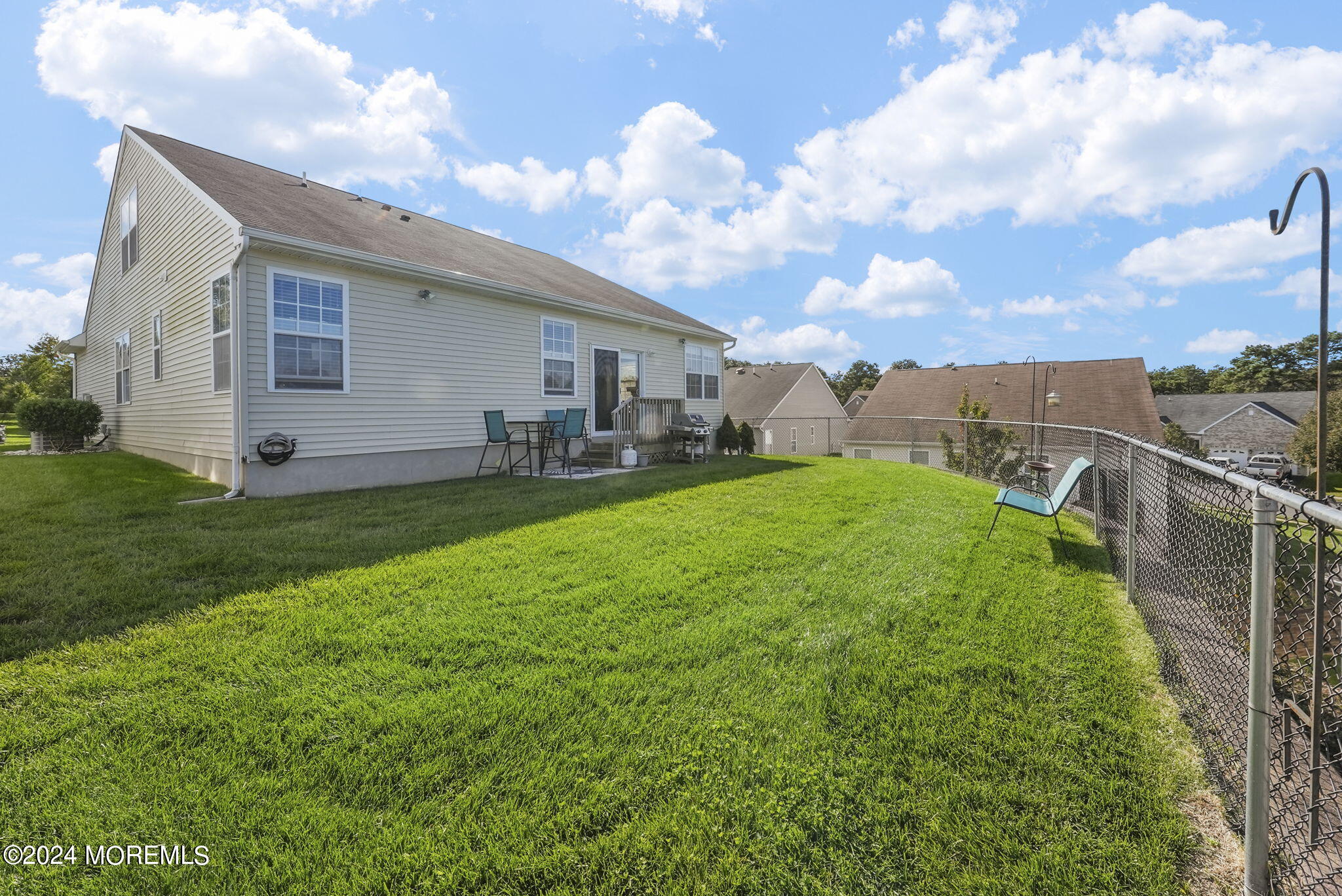 30 Silver Maple Lane Howell, NJ 07731 - Photo 34 of 43 a view of a house with backyard and sitting area