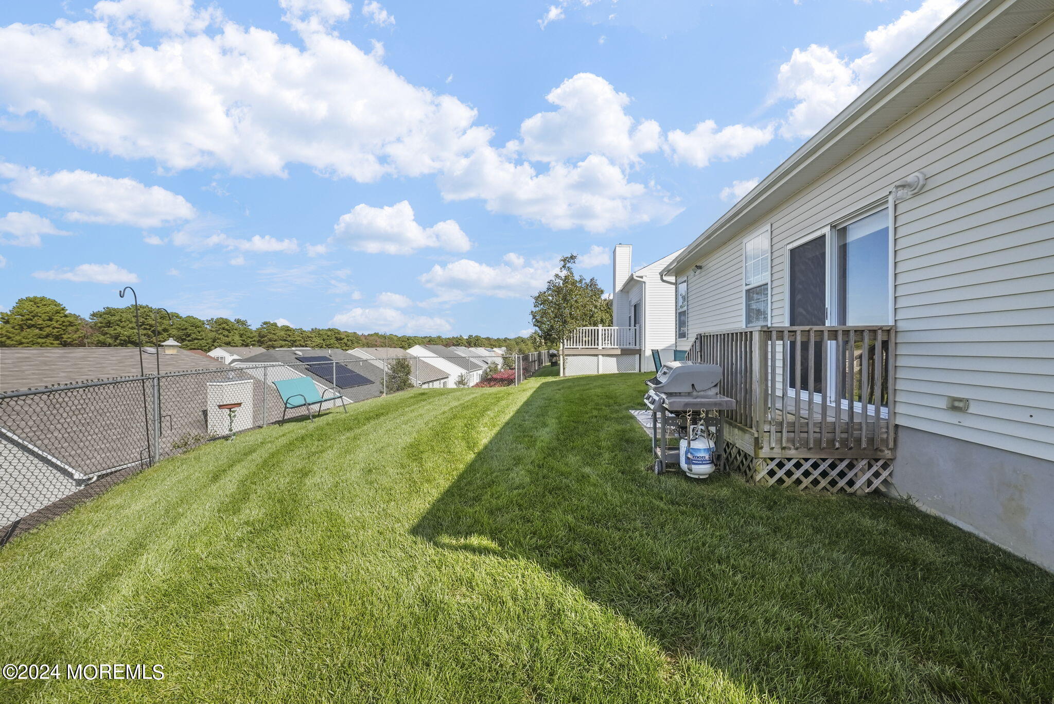30 Silver Maple Lane Howell, NJ 07731 - Photo 35 of 43 a view of a backyard with sitting area