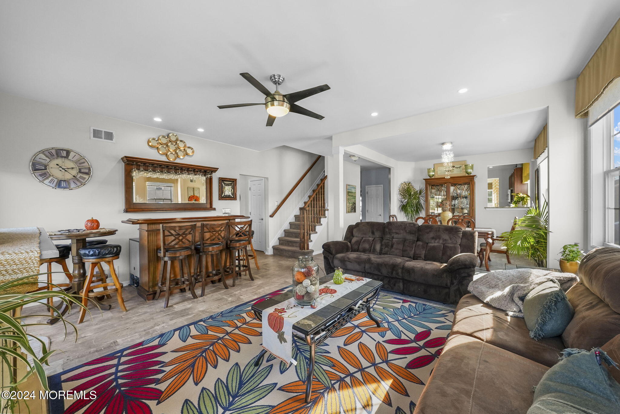 30 Silver Maple Lane Howell, NJ 07731 - Photo 10 of 43 a living room with furniture and wooden floor