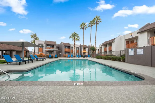 a view of a house with swimming pool