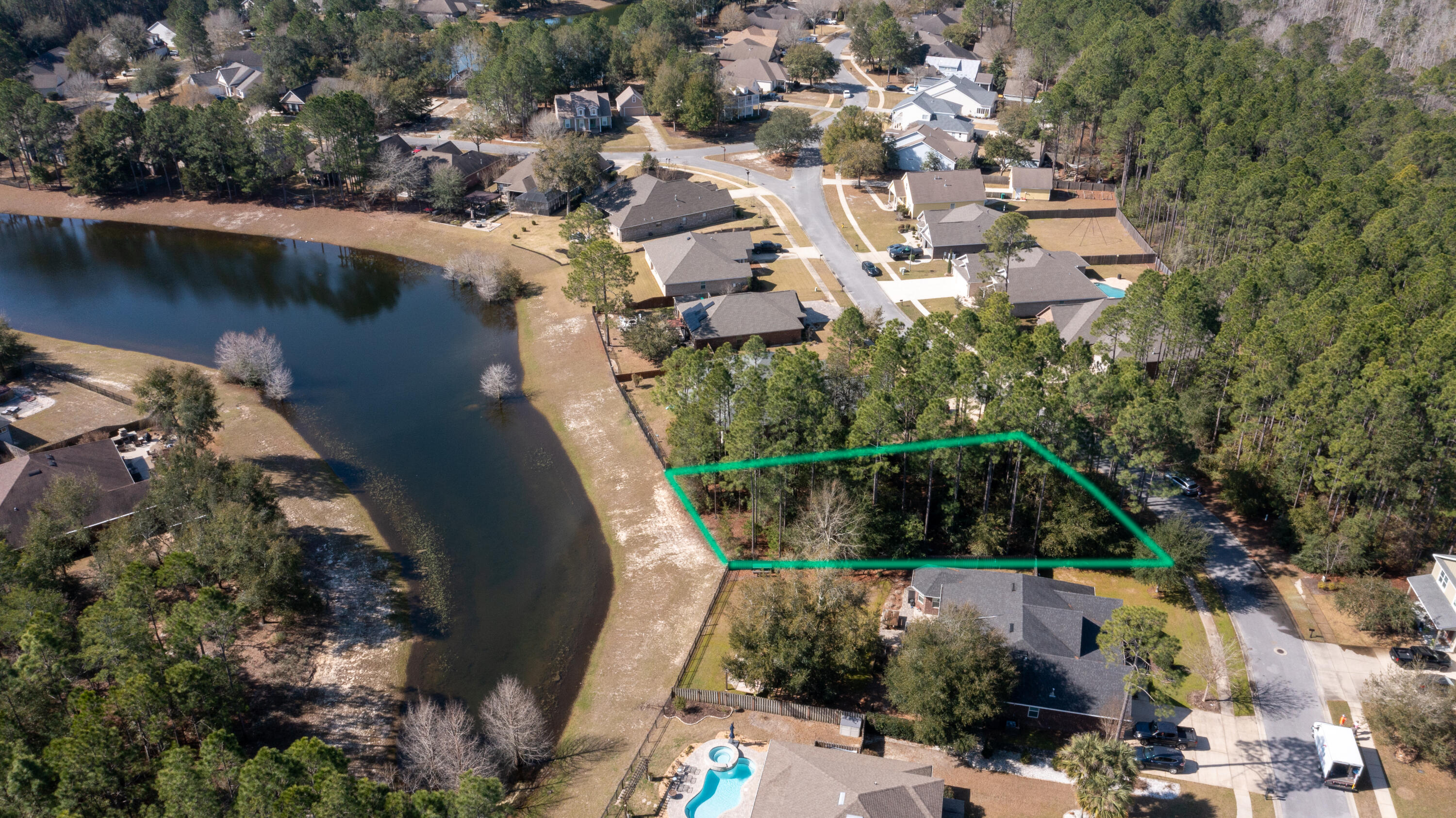 Lot 58 Concert Court Freeport, FL 32439 - Photo 4 of 37 an aerial view of residential house with outdoor space and lake view