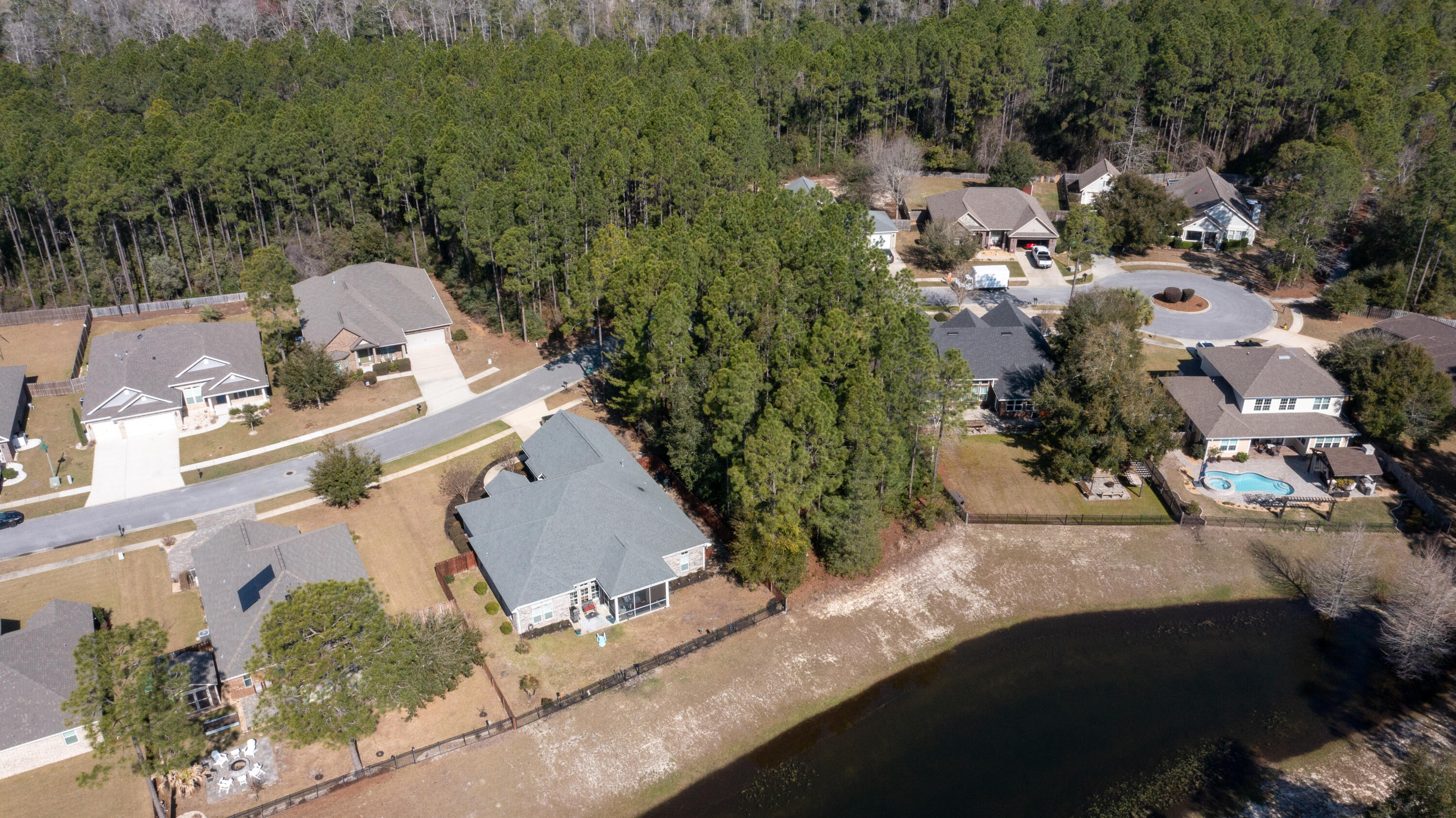 Lot 58 Concert Court Freeport, FL 32439 - Photo 9 of 37 an aerial view of a house with a yard and lake view