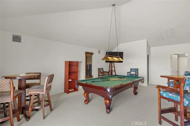 a spacious bathroom with a granite countertop tub sink and mirror