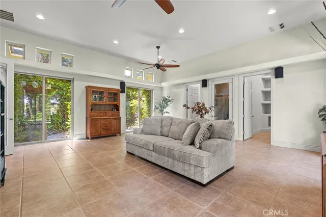 an aerial view of house with yard swimming pool and outdoor seating