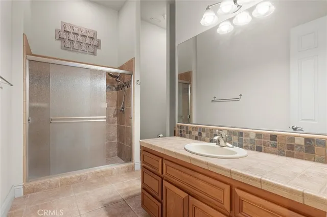 a view of a park with large trees