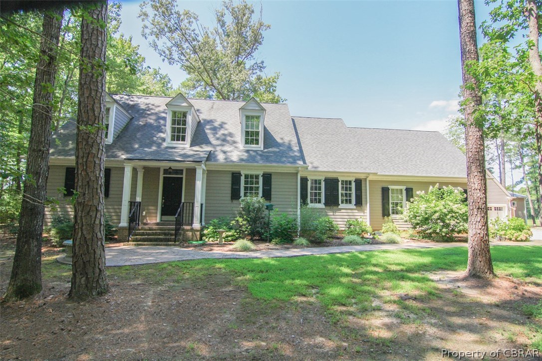 98 Flood Point Road Heathsville, VA 22473 - Photo 2 of 44 Coastal Home Design - Charming stone walk to covered porch, real shutters on windows, hardiplank siding, and very welcoming entrance to a great house.