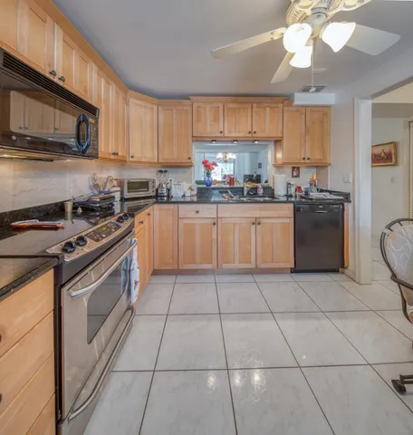 $315,000 | 250 John F Kennedy Drive, Unit 202, Atlantis, FL 33462