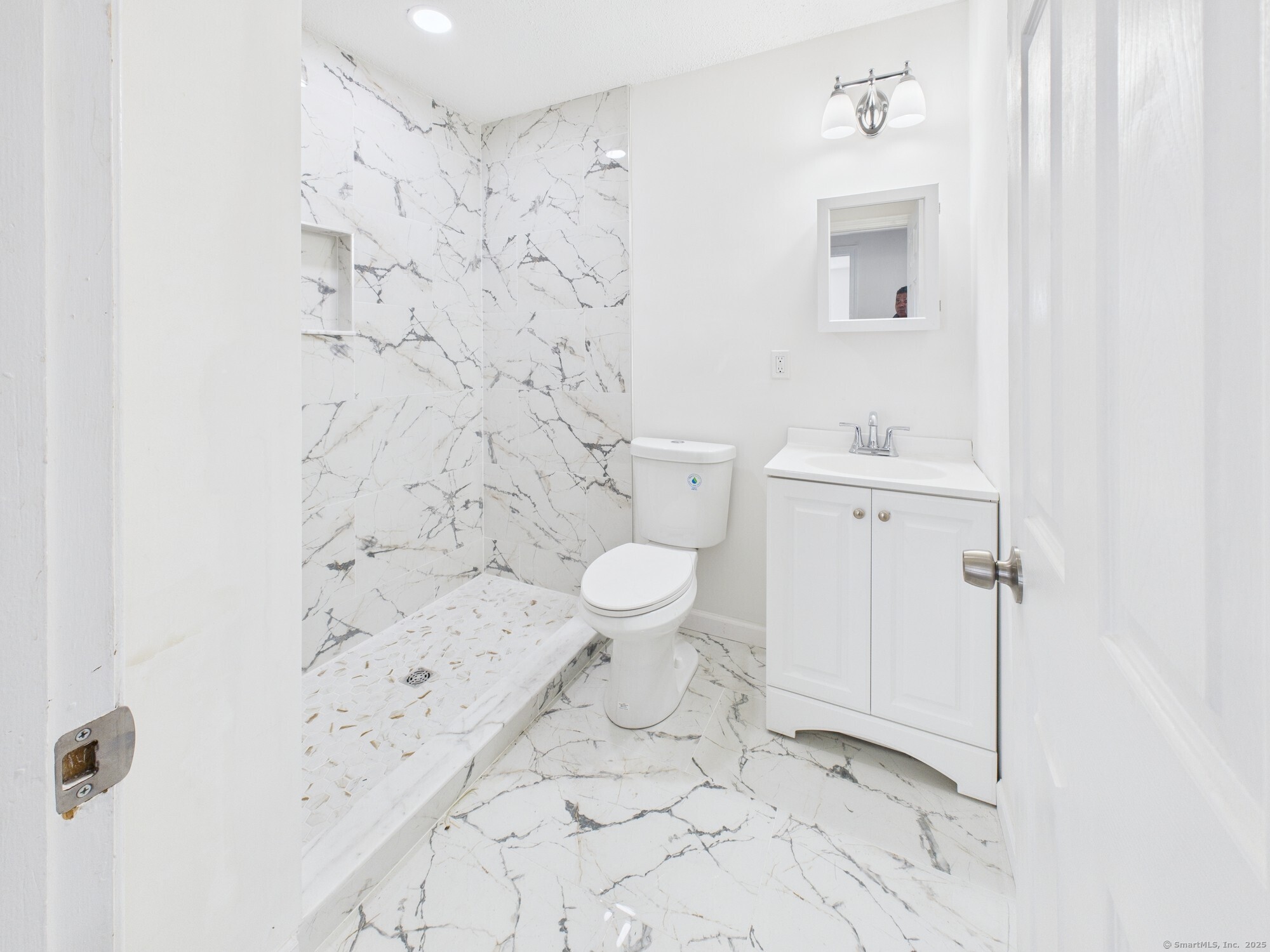 23 Dewitt Street New Haven, CT 06519 - Photo 11 of 36 a bathroom with a toilet and a shower