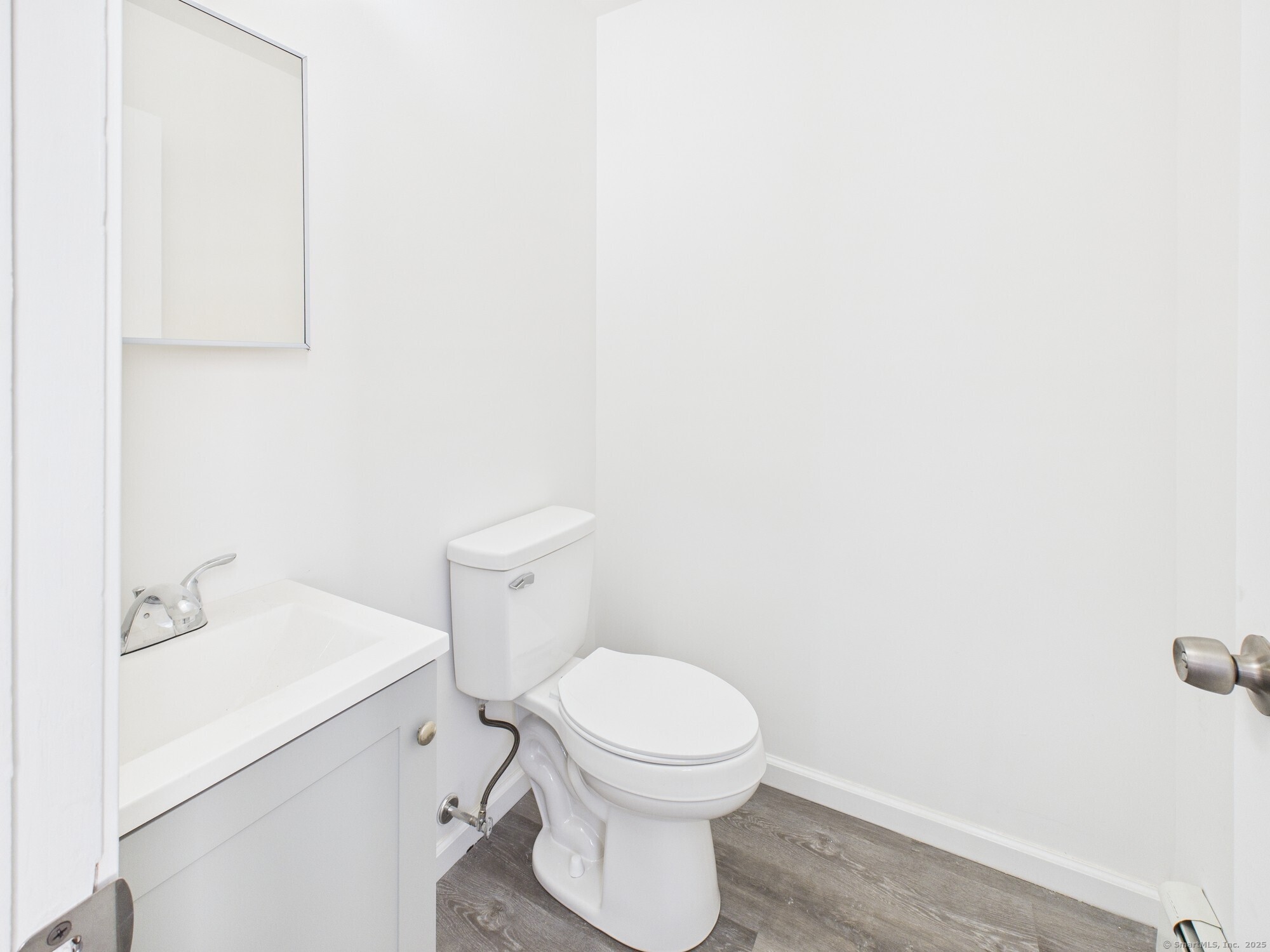 23 Dewitt Street New Haven, CT 06519 - Photo 19 of 36 a white toilet sitting next to a white sink