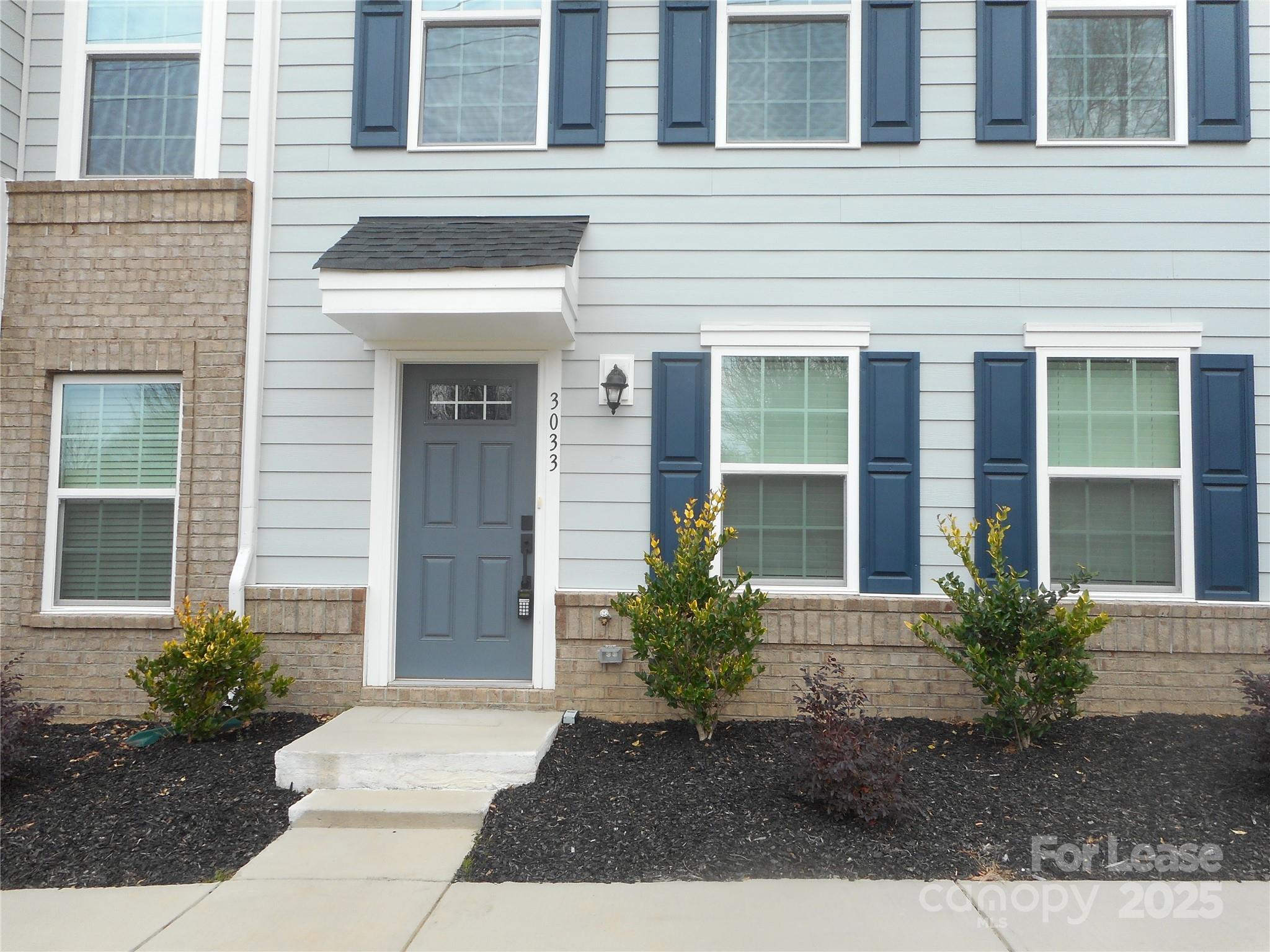 3033 Matthews-Indian Trail Road Matthews, NC 28104 - Photo 2 of 30 a front view of a house