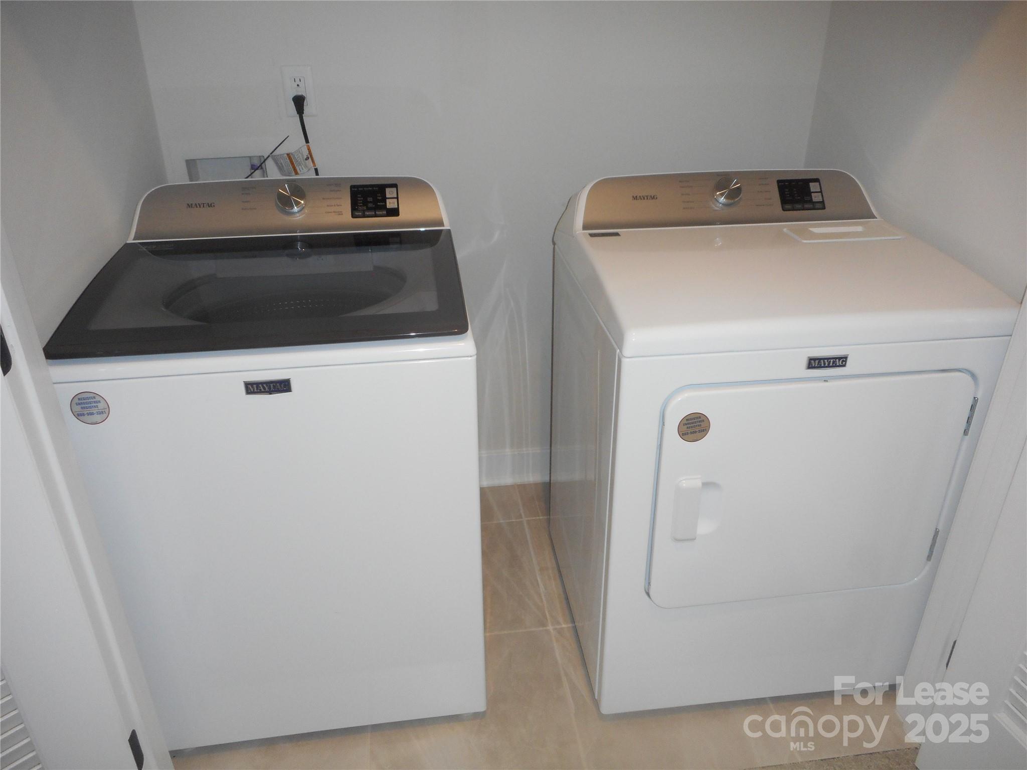 3033 Matthews-Indian Trail Road Matthews, NC 28104 - Photo 25 of 30 a utility room with dryer and washer