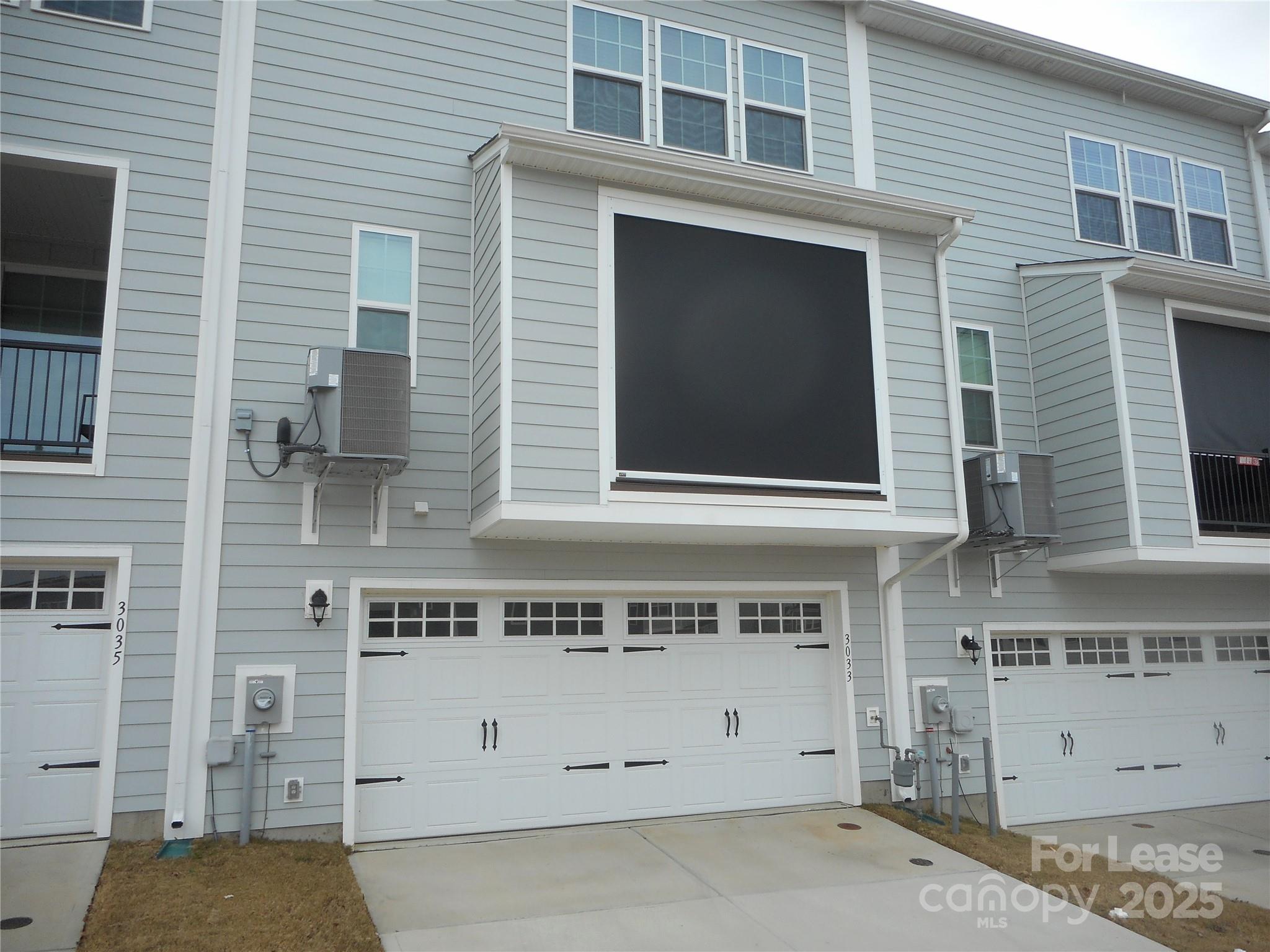 3033 Matthews-Indian Trail Road Matthews, NC 28104 - Photo 27 of 30 a front view of a building with white wall