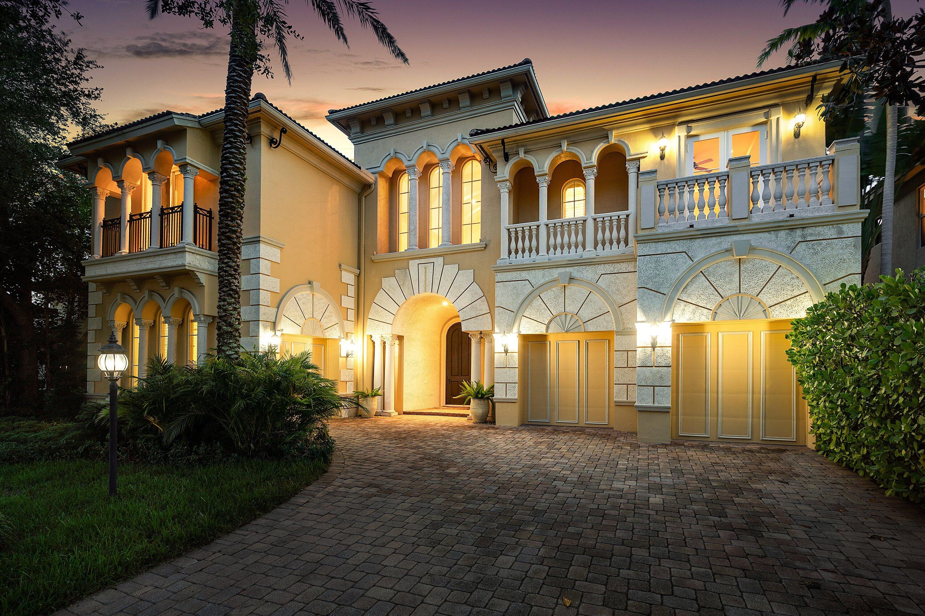 17387 Balaria Street Boca Raton, FL 33496 - Photo 1 of 65 a front view of a house with a yard and outdoor seating