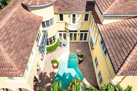 a view of a hallway with staircase