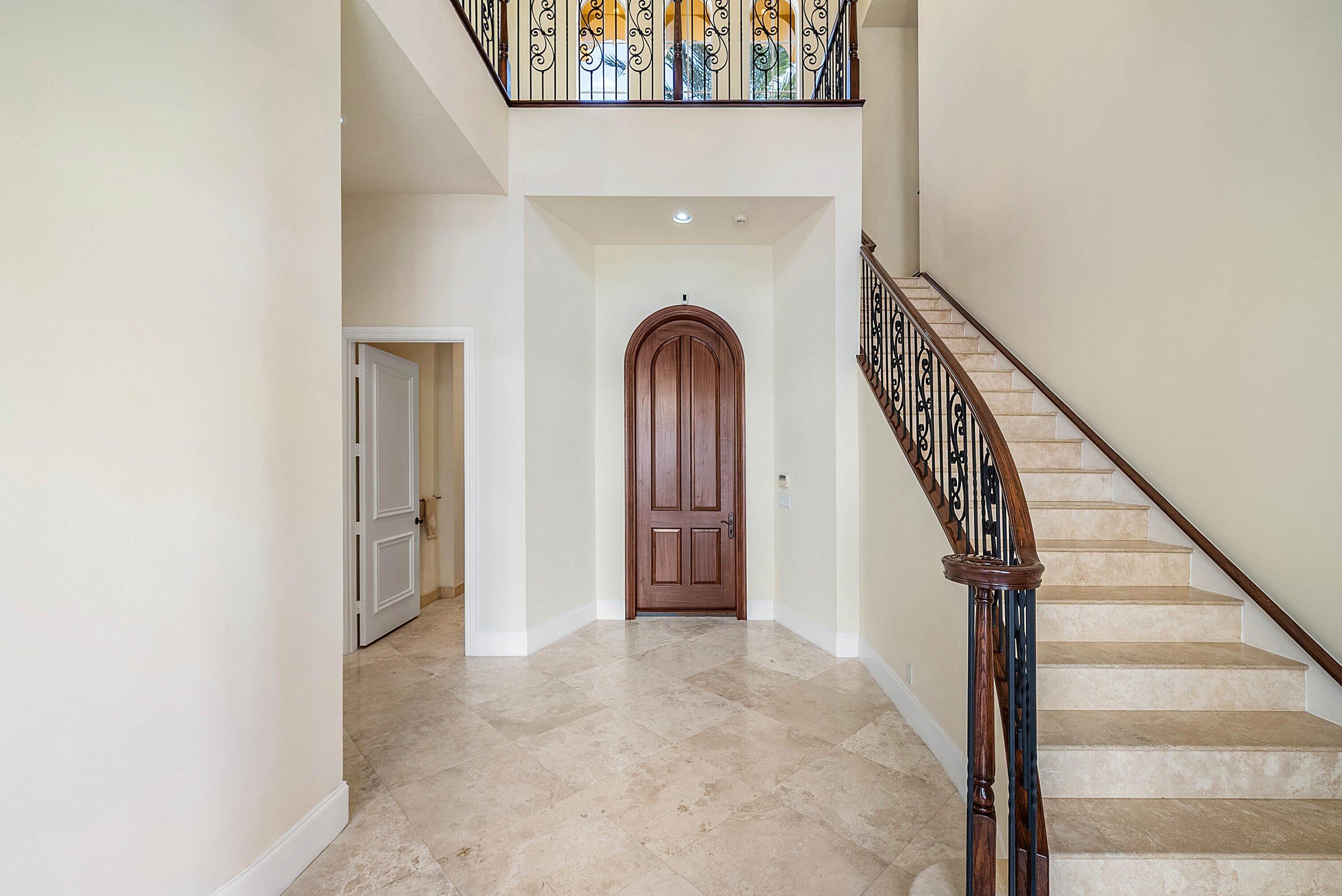 17387 Balaria Street Boca Raton, FL 33496 - Photo 14 of 65 a view of front door with stairs