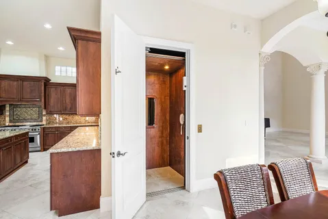 a view of a hallway with windows