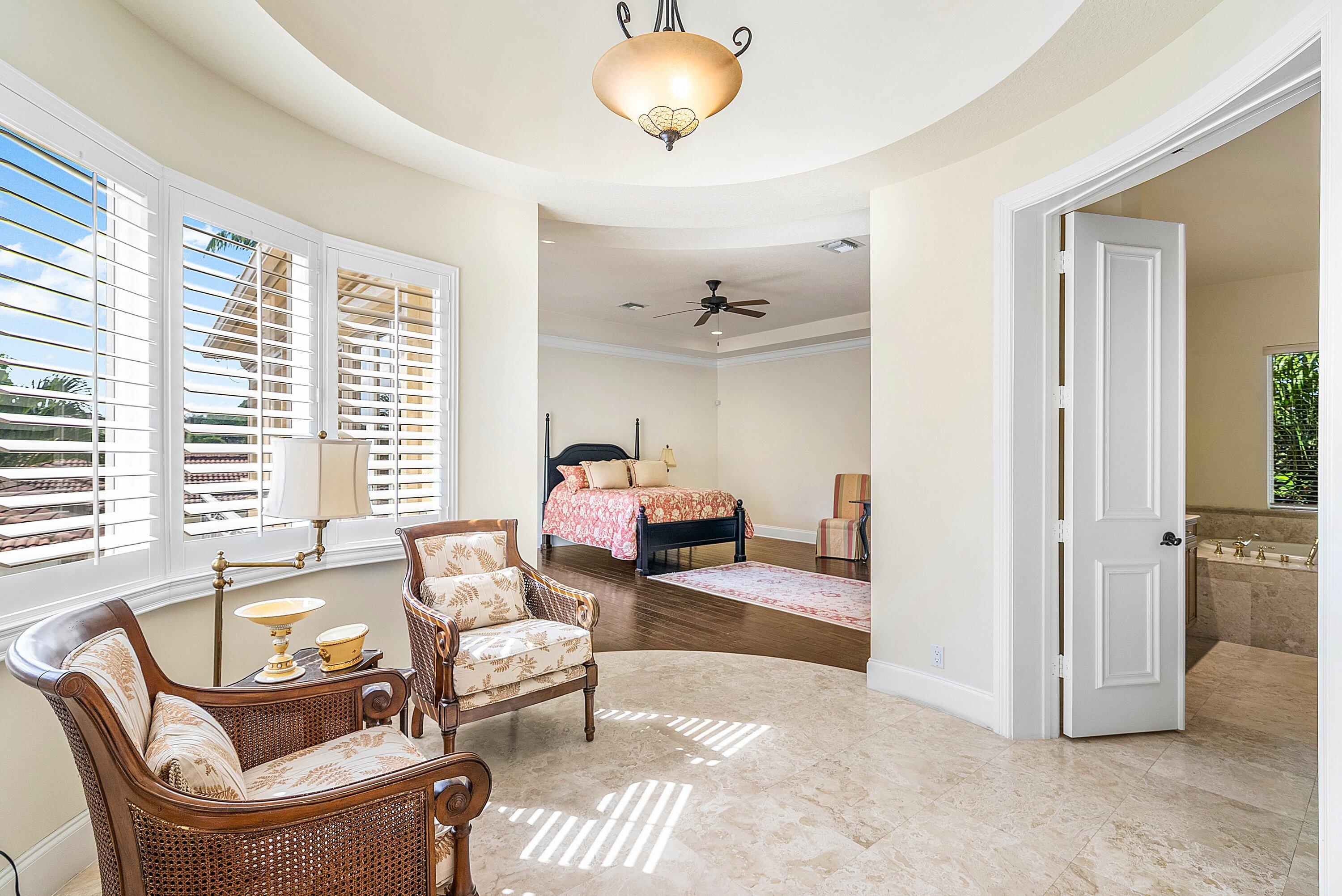 17387 Balaria Street Boca Raton, FL 33496 - Photo 38 of 65 a living room with furniture and a large window