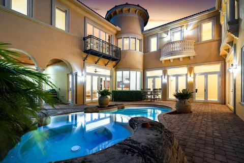 an aerial view of house with yard