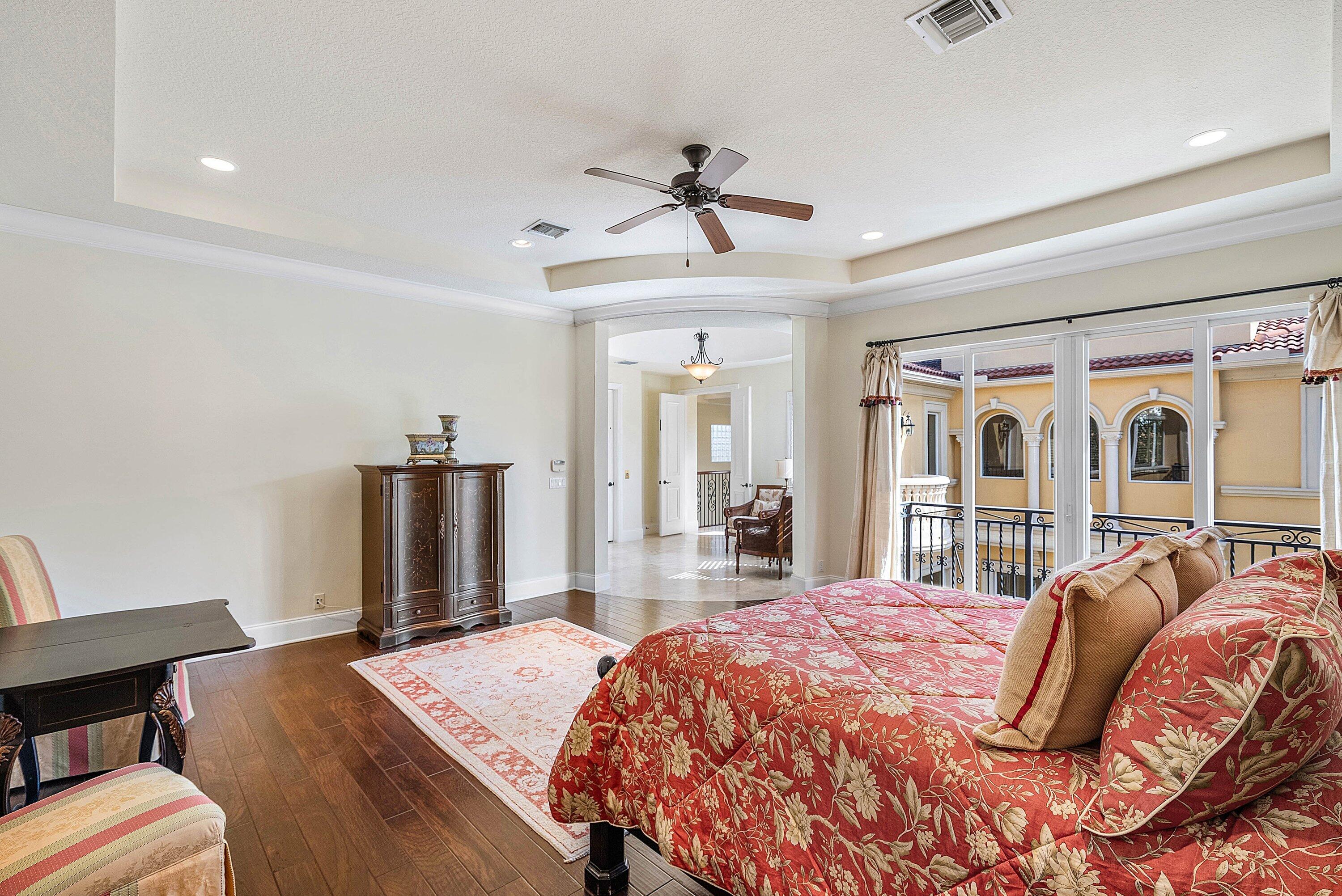 17387 Balaria Street Boca Raton, FL 33496 - Photo 41 of 65 a bed sitting in a bedroom next to a window